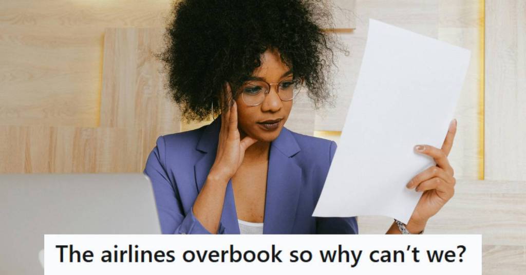 Woman sitting at the laptop looking over the list of reservations for the day