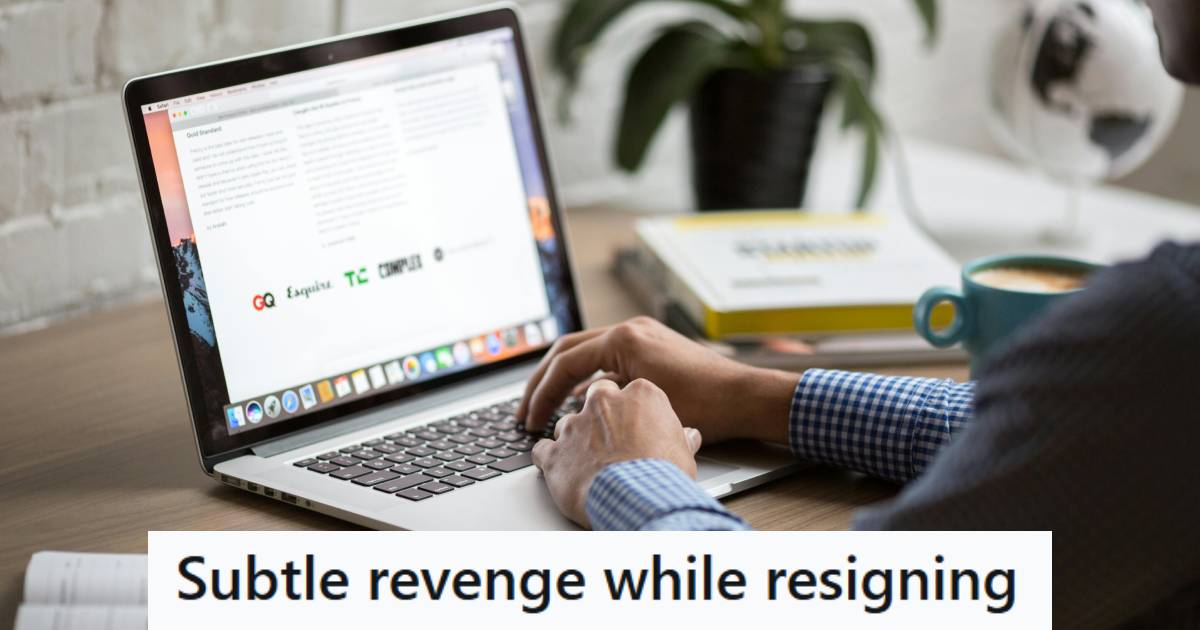 Man sending an email to his boss, telling him he's resigning