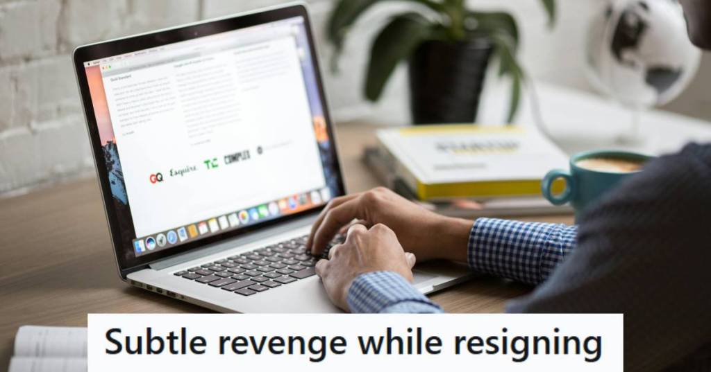 Man sending an email to his boss, telling him he's resigning