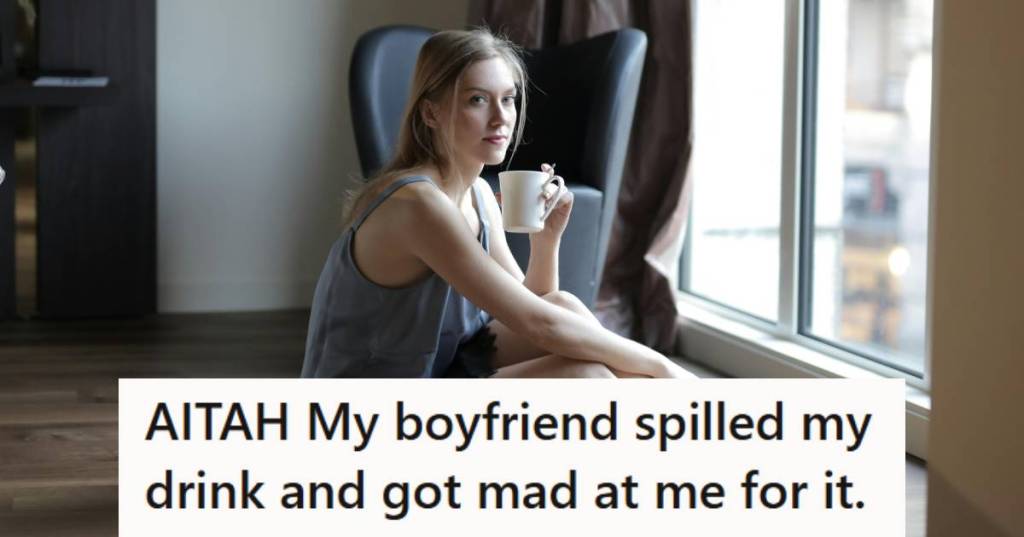 Woman sitting on the floor in her bedroom drinking a drink