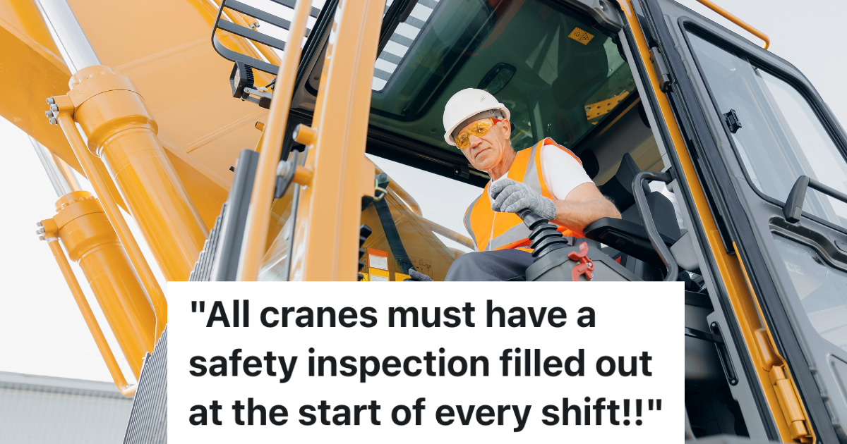 man in hardhat operating crane