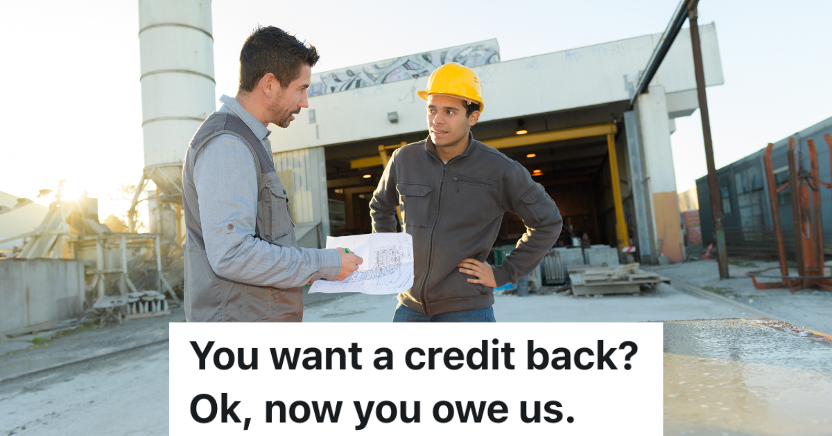 two men talking at a construction site
