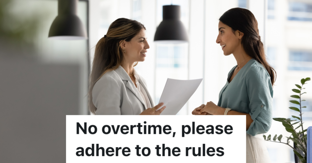 two business women talking in an office