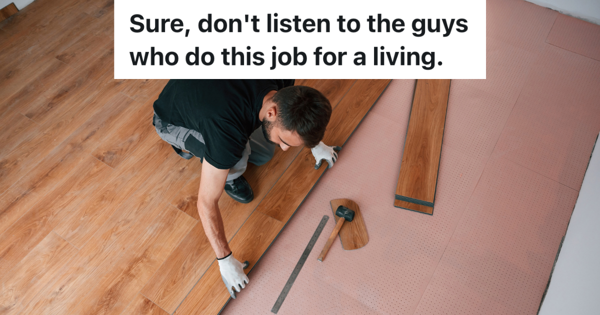 man installing wooden flooring