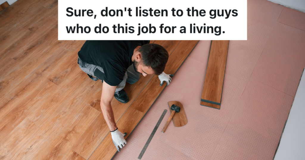 man installing wooden flooring