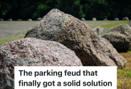 Two Businesses Have A Connecting Parking Lot, But When One Business Hogs The Parking Spots, The Other Separates Them With Big Rocks