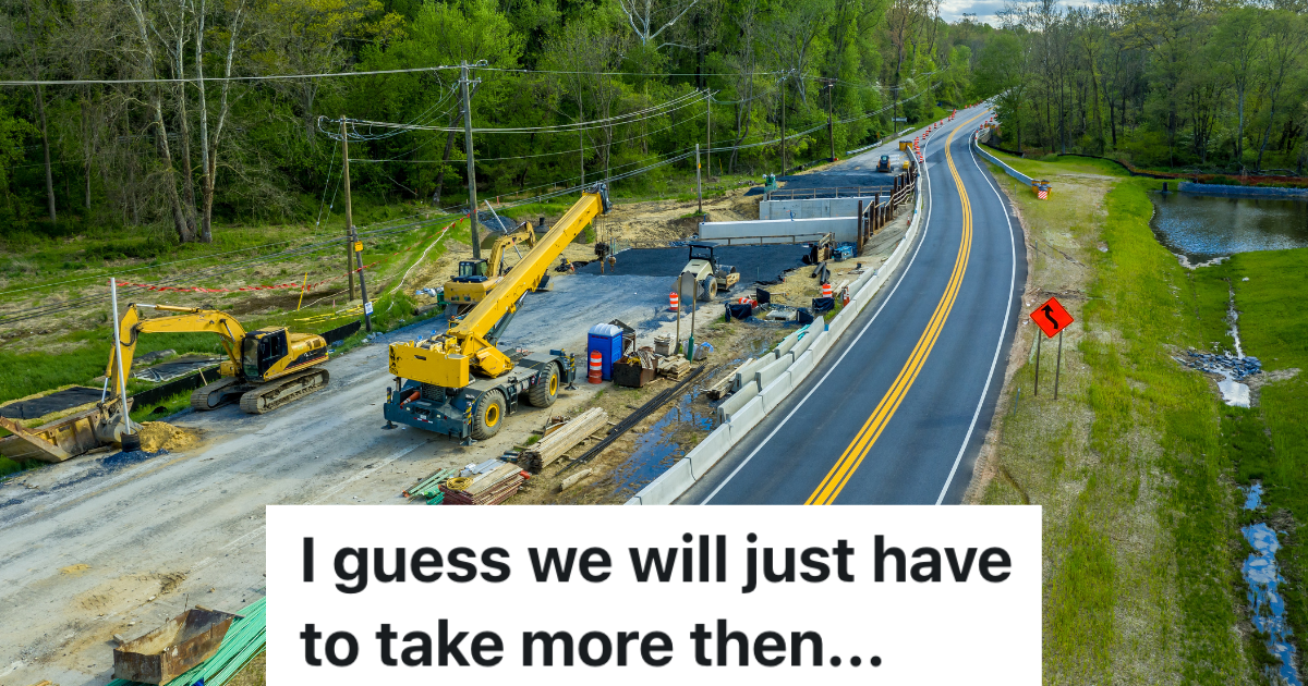 Aerial view of expanding a two lane road to a four lane highway with heavy construction equipment