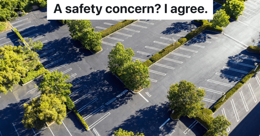 empty parking lot with shade trees