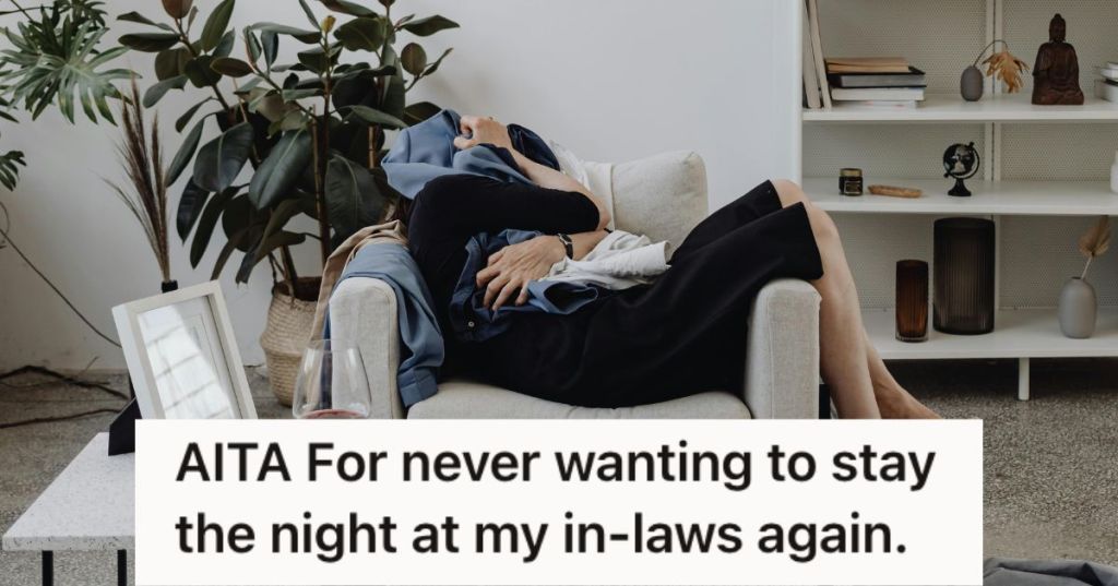 Woman covering her face with jacket and trying to sleep on a chair