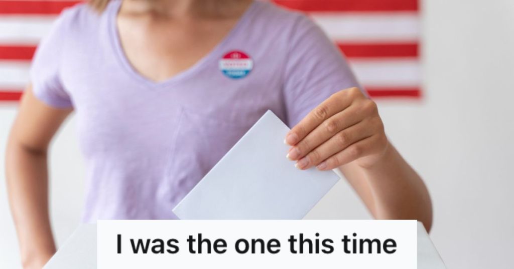 Woman dropping her ballot in the box with the Amrican flag at the back