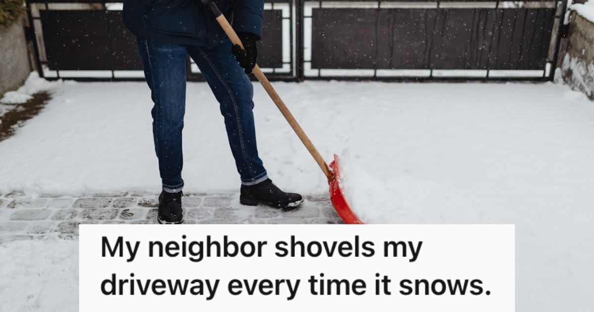 Man shoveling snow on the driveway