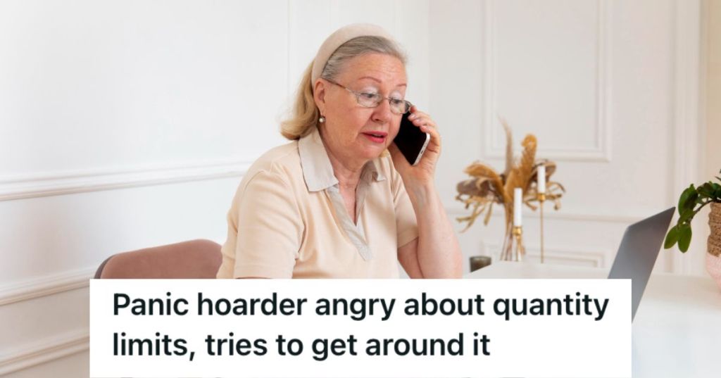 Elderly woman talking to someone on the phone while browsing her laptop