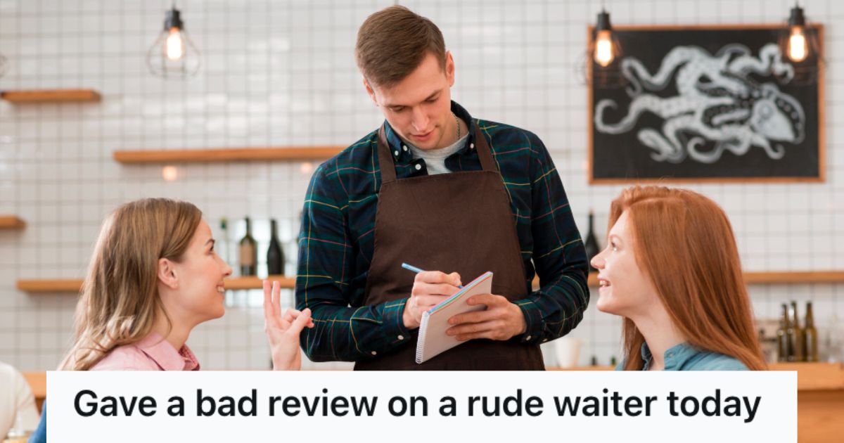 Waiter getting the orders of two female customers