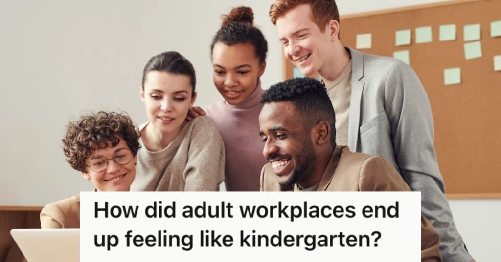 Happy employees huddling up in the office