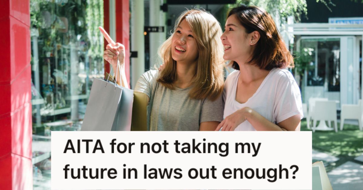 Two women carrying shopping bags