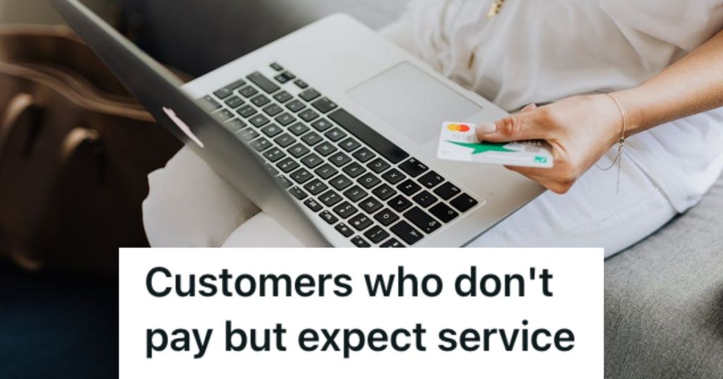 Person using her laptop while holding a credit card