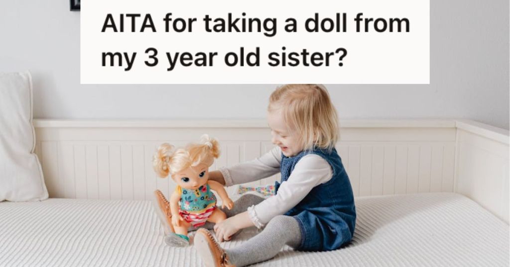 Toddler playing with a doll