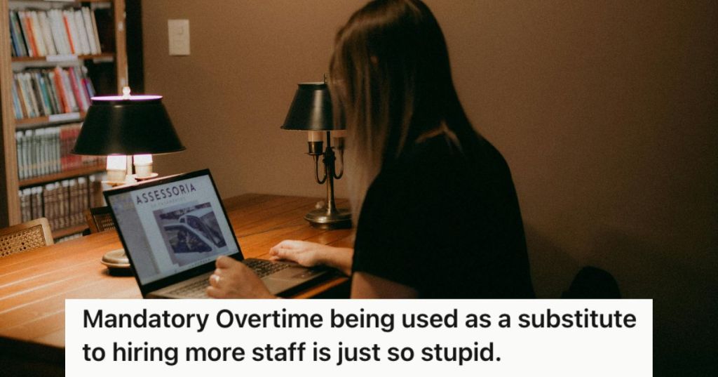 Woman working in teh dark with her computer