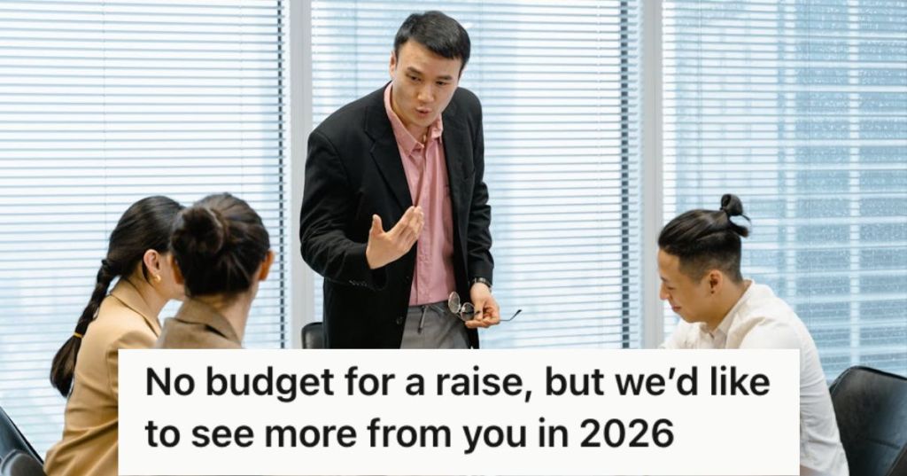 A male boss talking to his employees