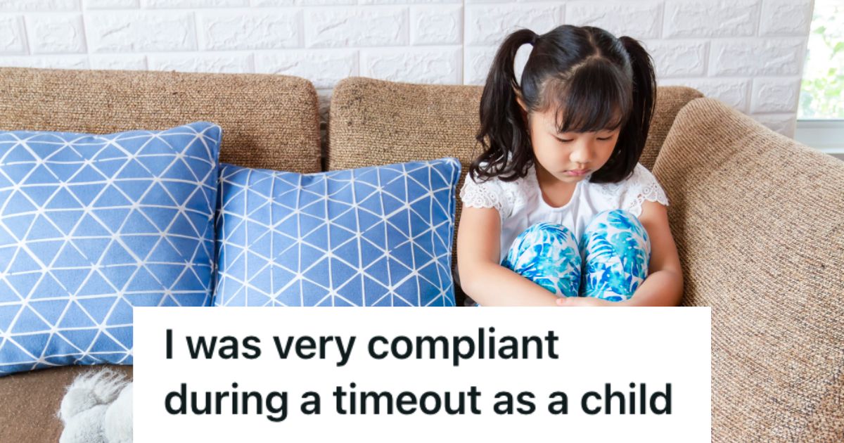 A sad little child sitting on a couch