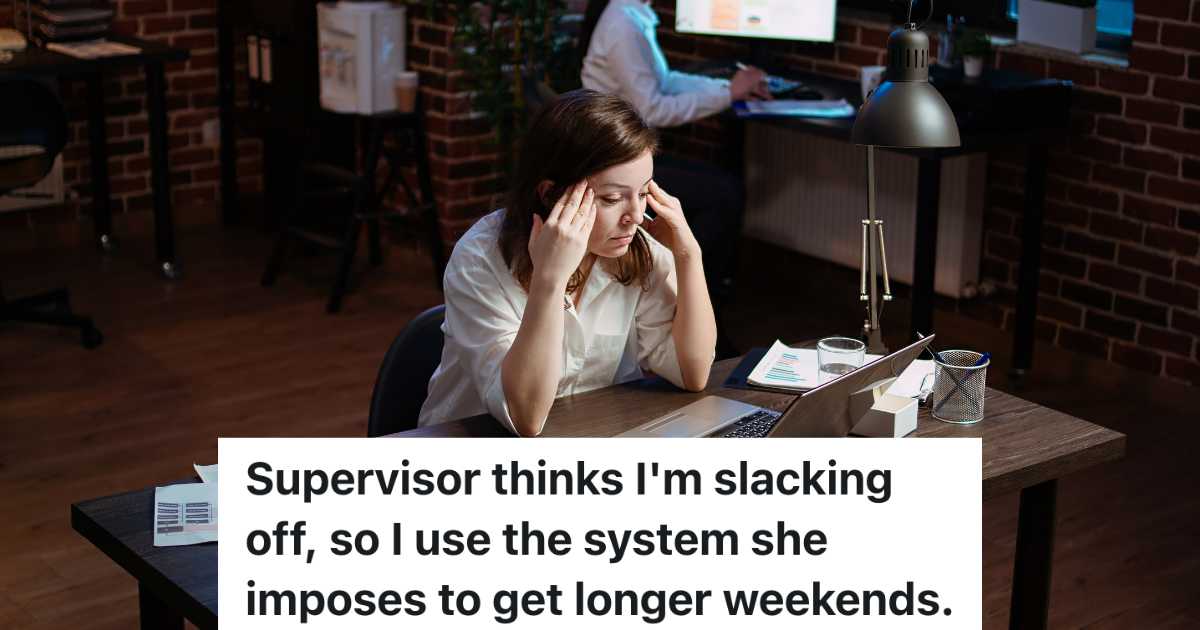 stressed out employee sitting at desk in front of laptop