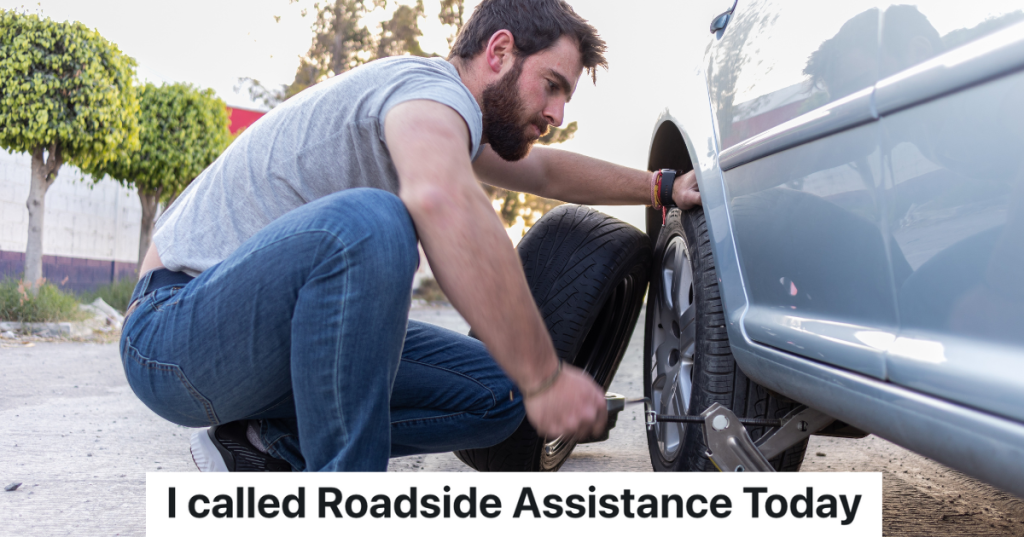 man changing car tire