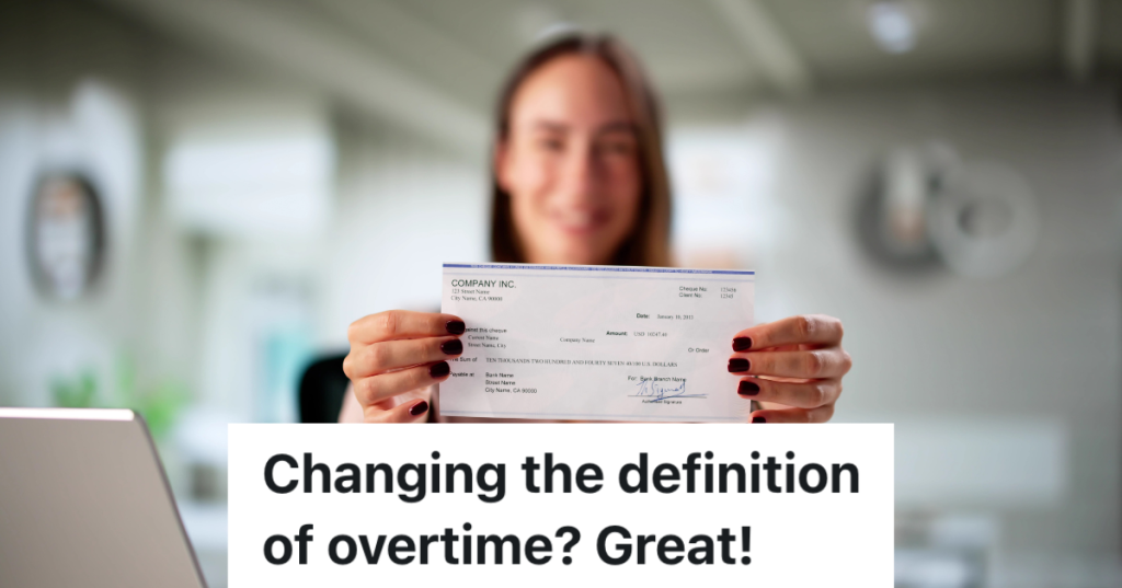blurred out woman happily holding a paycheck