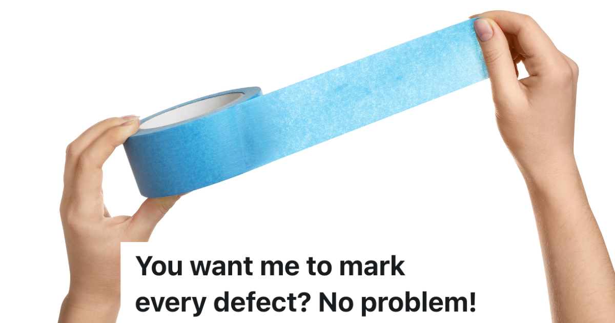 closeup of woman holding blue painters tape