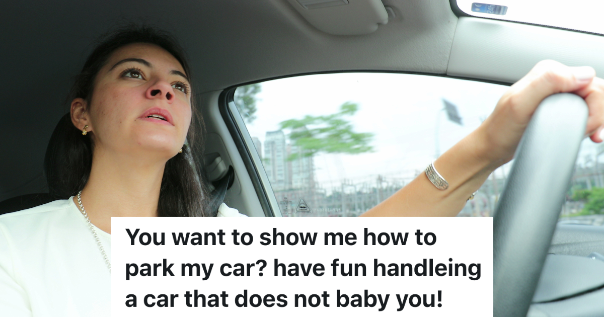 woman looks up with one hand on car's steering wheel 