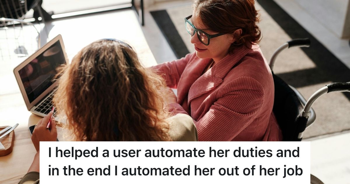 Two women looking at a laptop