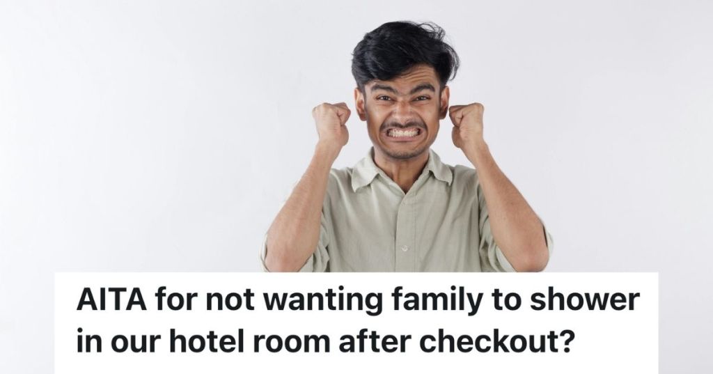 Man scowling with his fists in their air