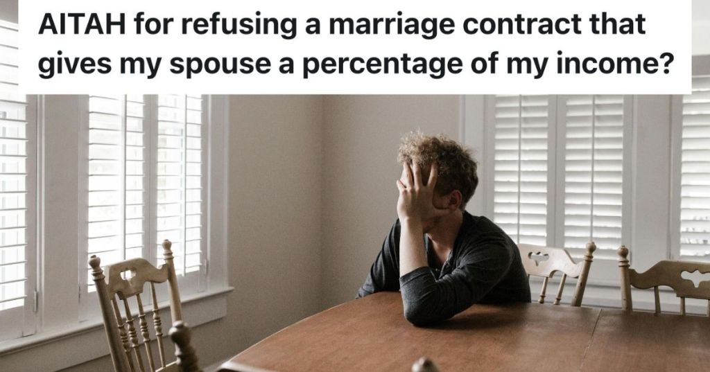 Man looking despondent at a dining table