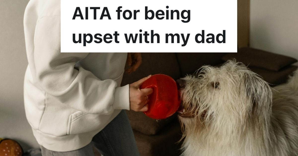 Man holding leash with dog