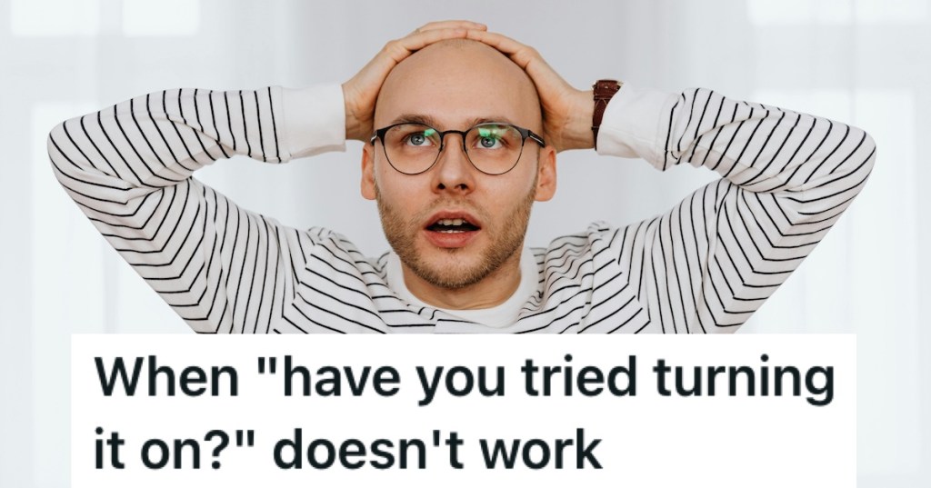 A bald man with his hands on his head