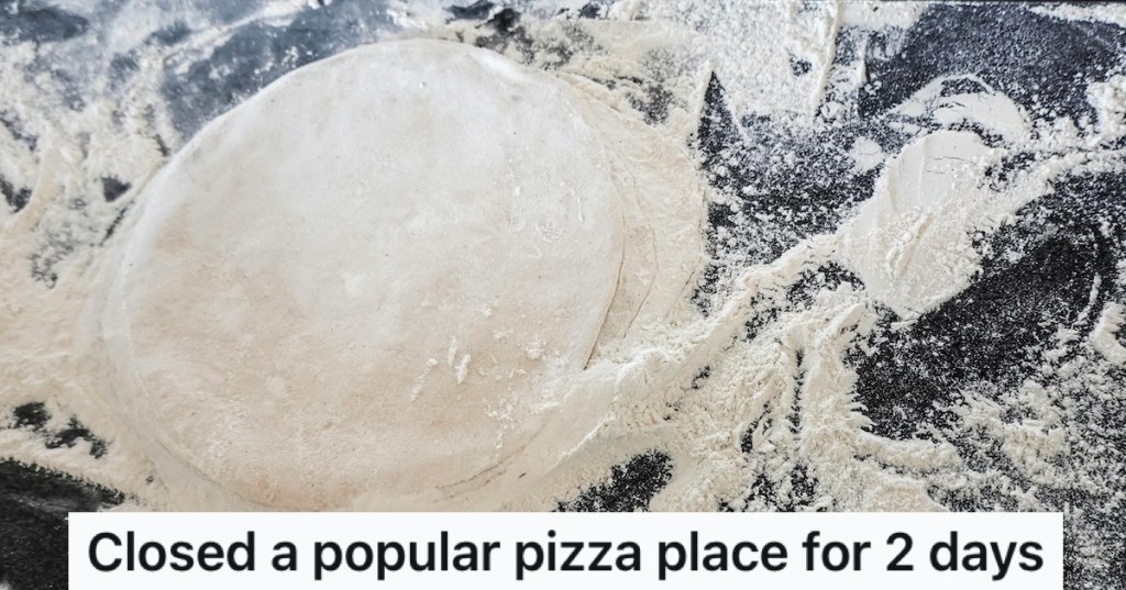 Pizza dough on a floured surface