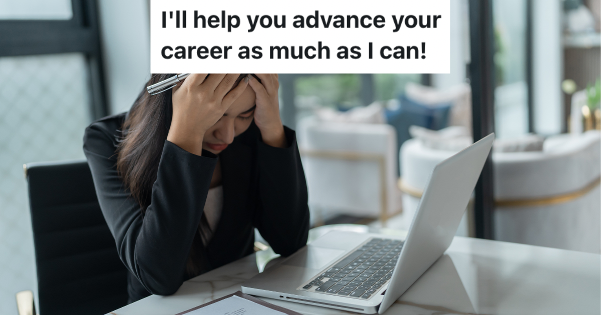 Woman sitting in front of laptop with head in her hands.