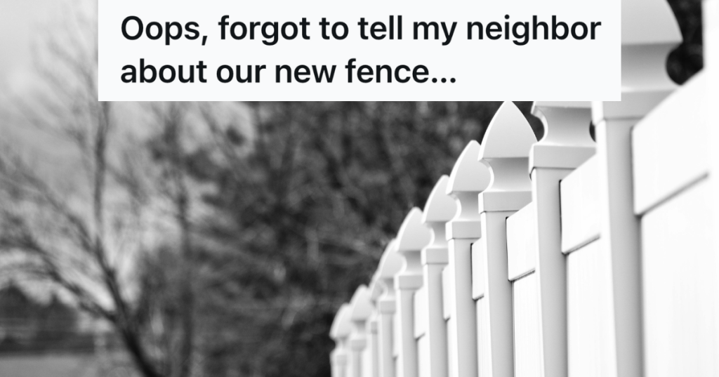 black and white image of a fence