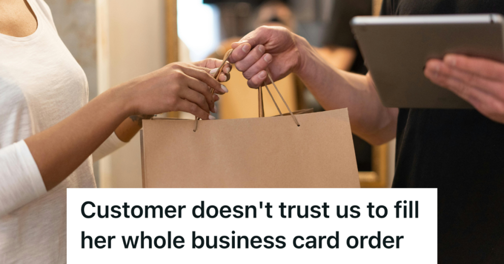 cashier handing customer a bag