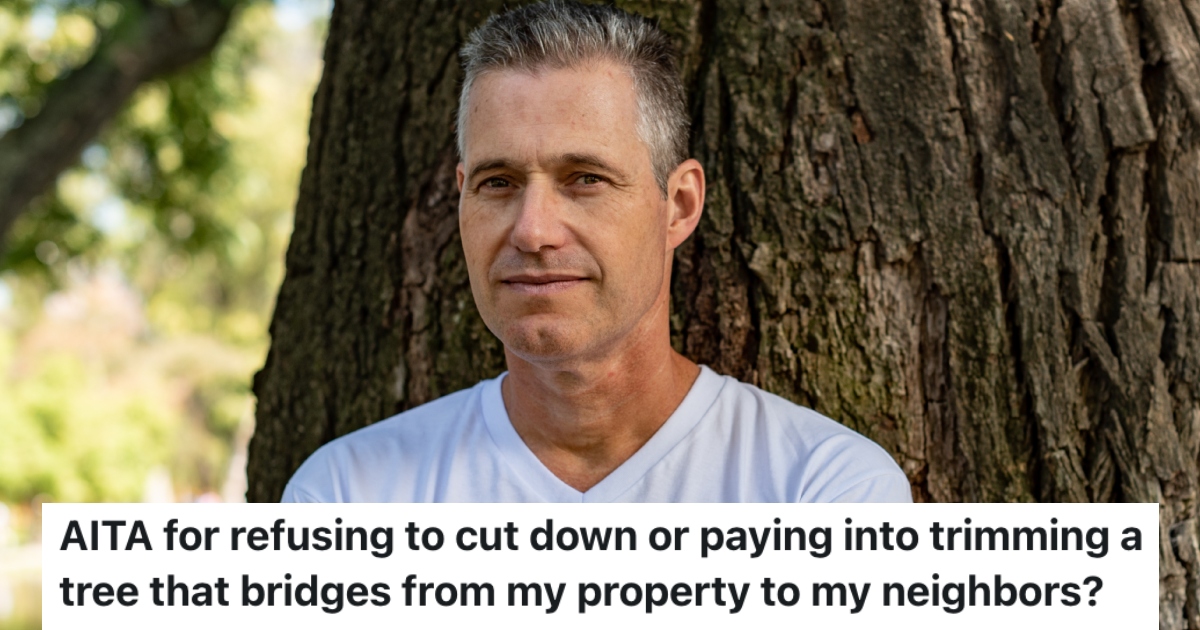 man in front of a tree