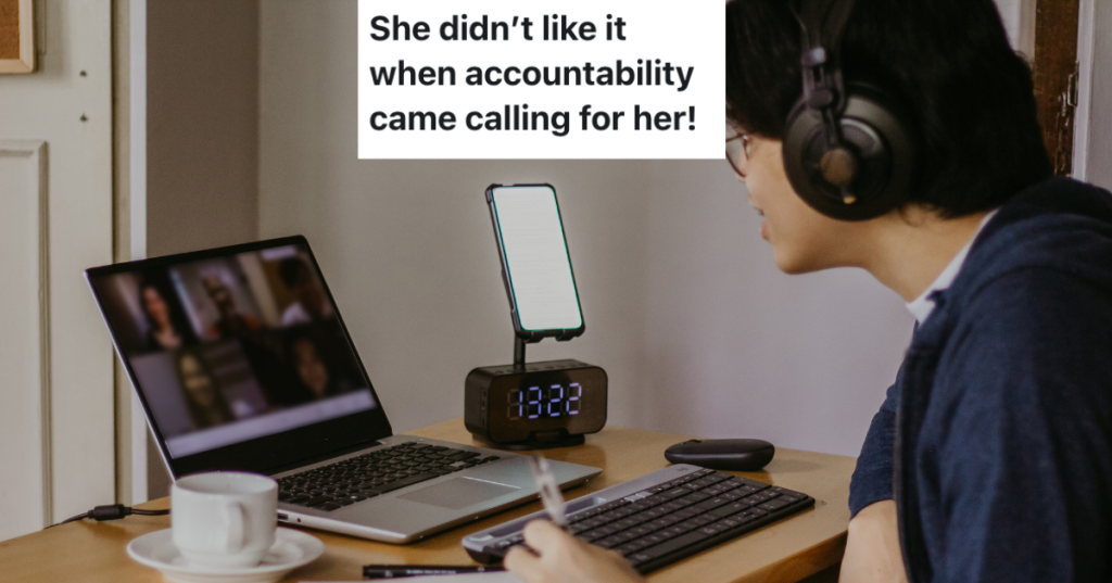 Person wearing headphones on a group video call.