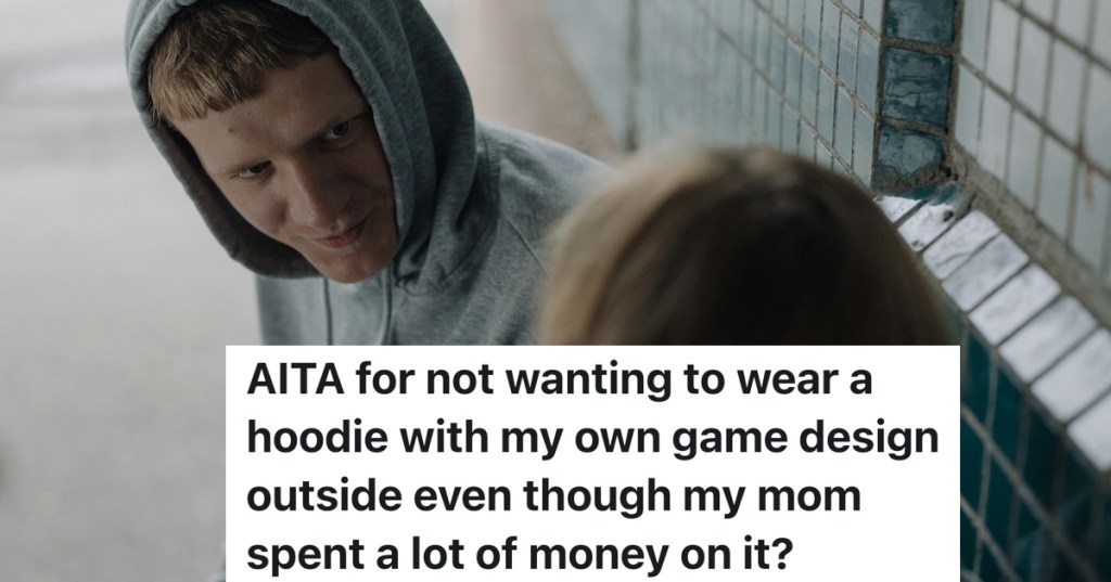 male looking at female wearing a hoodie