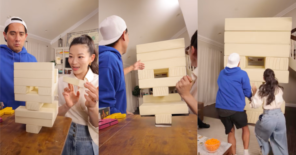 a couple playing jenga