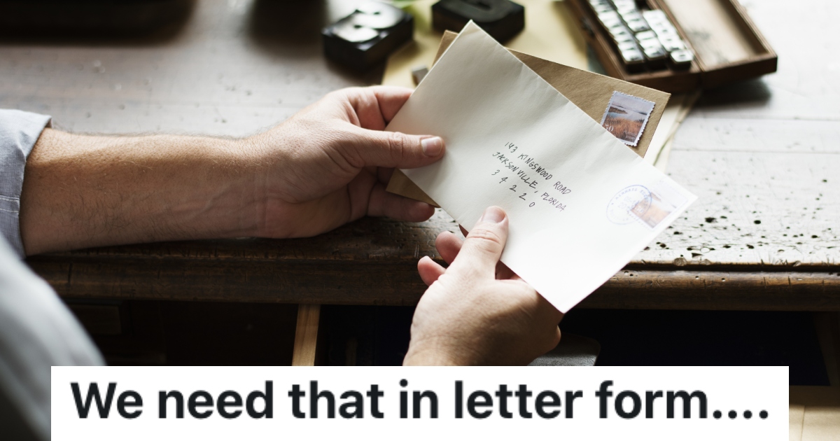 man holding a letter