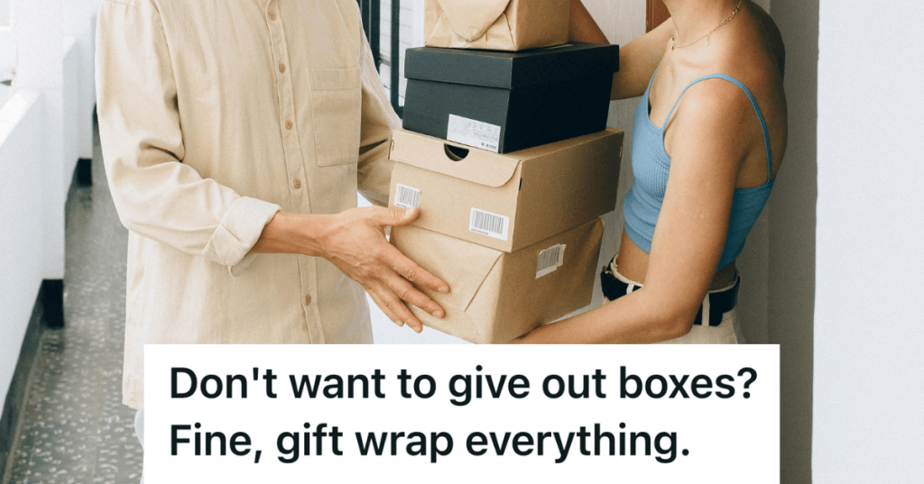 man handing woman stack of boxes