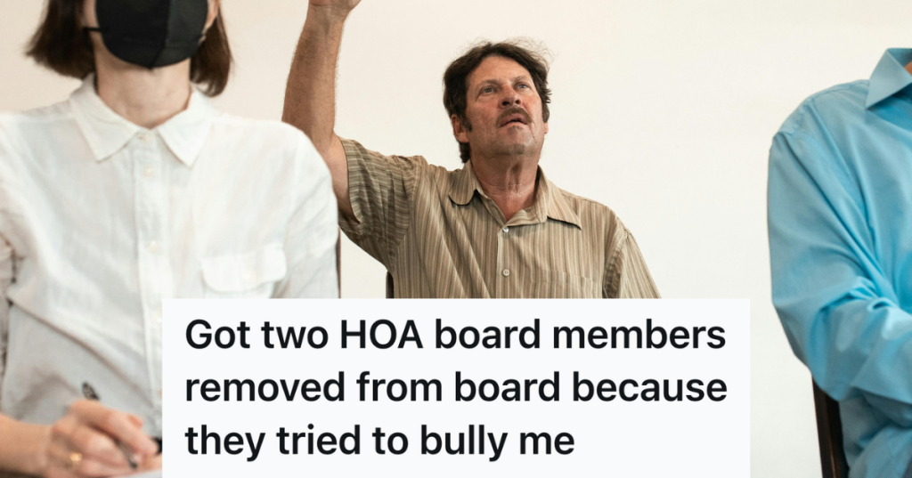 man raising hand at hoa meeting