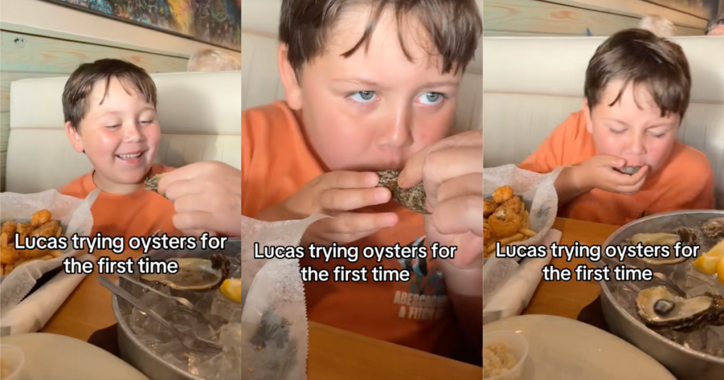 young boy eating oysters