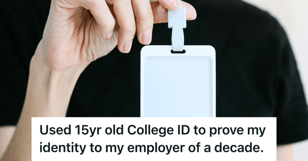 person holding up ID card