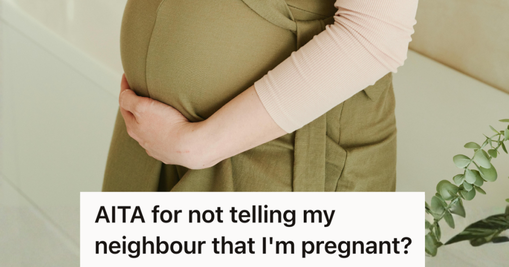 pregnant woman holding her baby bump