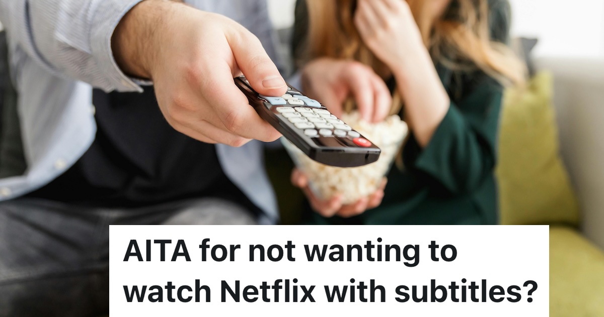 person holding the remote out