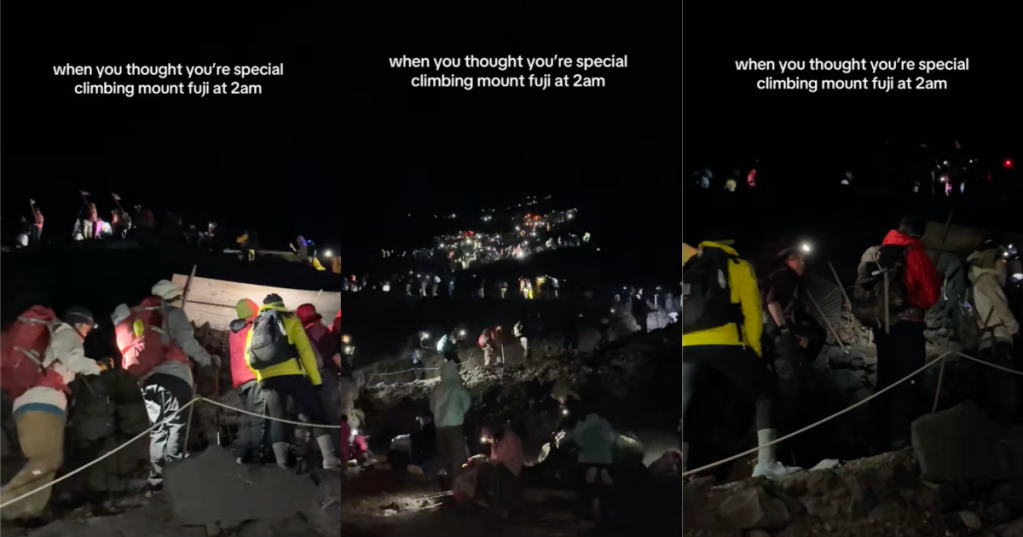people climbing mount fuji